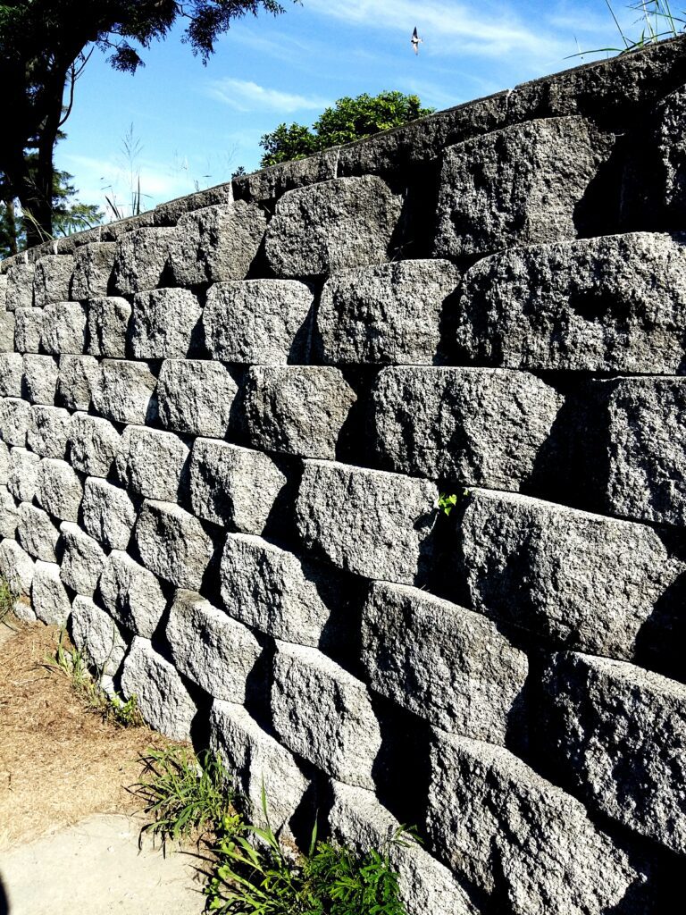 stone-wall-field-against-sky
